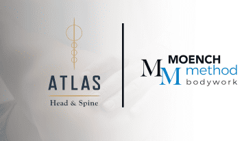 A logo of atlas head and spine, with the company name on it.