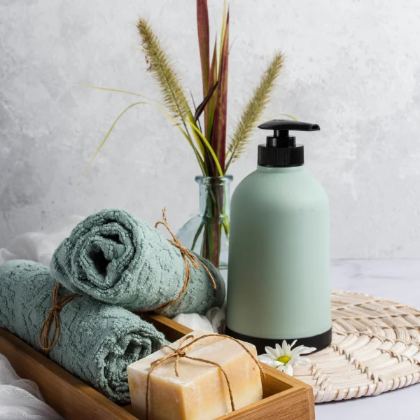Spa essentials with towels and soap bars.
