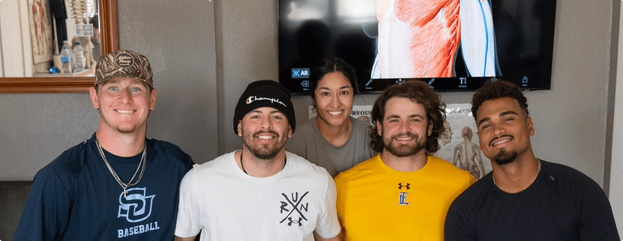 therapist with 4 college baseball clients
